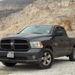 Автомобил Dodge RAM 1500 в планински пейзаж България, оф-роуд, снимка на товарен камион.