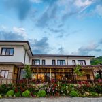 Hillview Bulgaria's restaurant overlooks the mountain and features a flower garden.